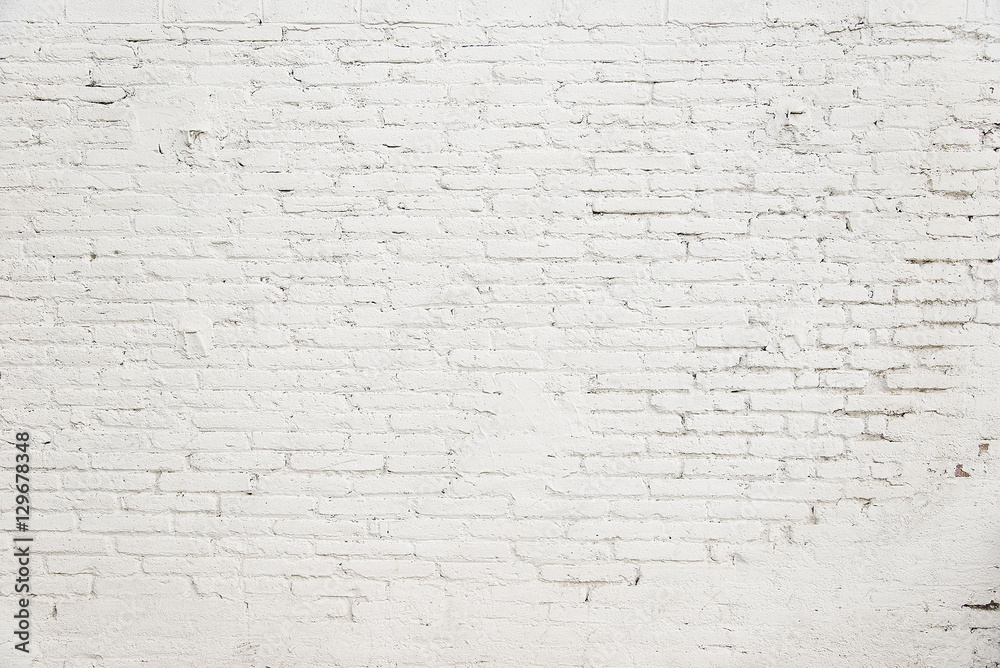 Old brick wall with white paint background texture Old brick wall with white paint background texture