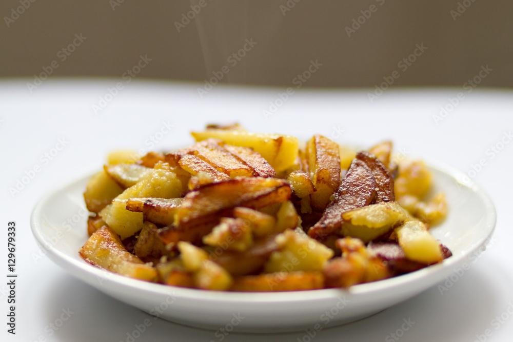 Fried potatoes on a plate Fried potatoes on a plate