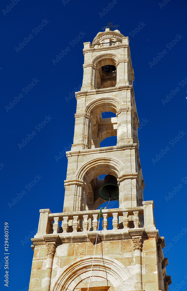Belfry in sunlight at old city Lindos, Rodes