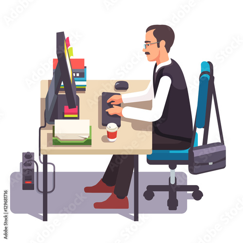 Clerk man working on a desktop computer