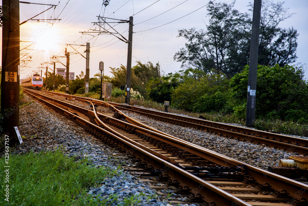 Train tracks in the late afternoon sun light.