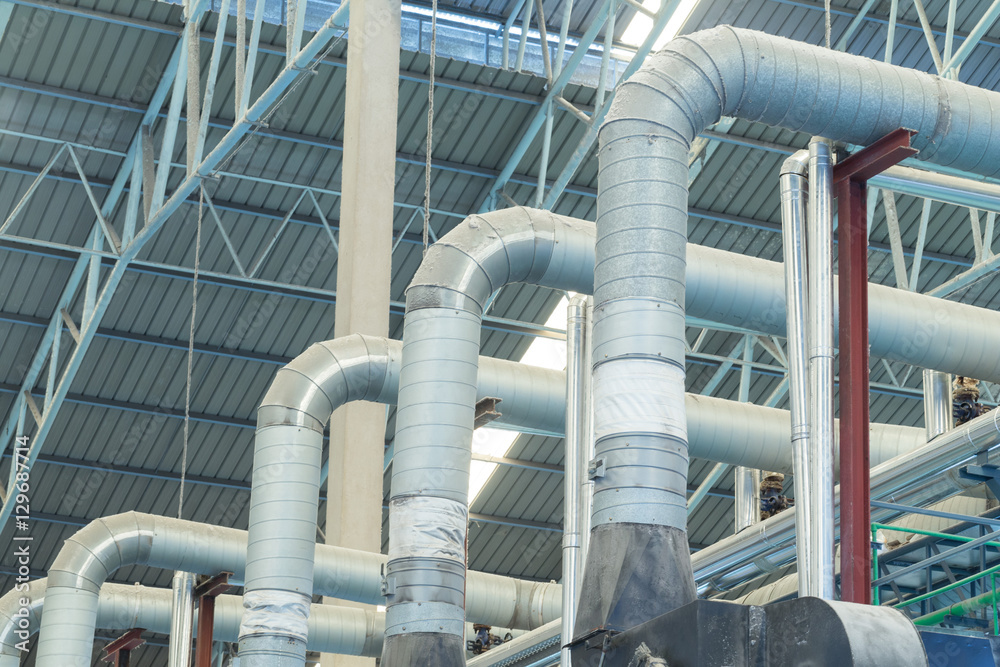 Pipes and ventilation ducts in large industrial plants. Pipes and ventilation ducts in large industrial plants.