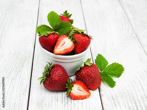 ripe strawberries on wooden table