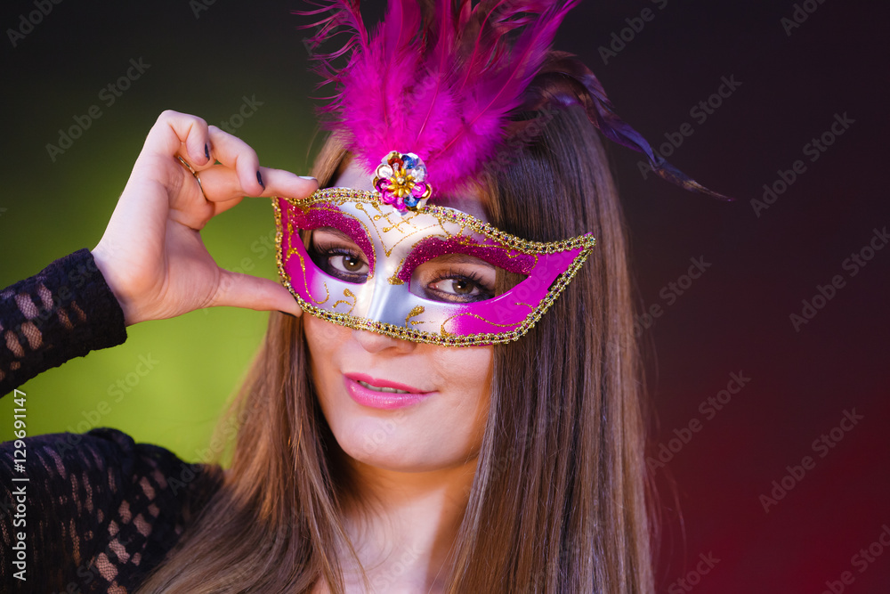 Sensual woman with carnival mask.