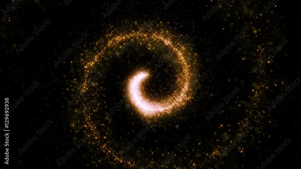 Gold glittering star dust twisted spiral of trail sparkling particles on black background. Space comet tail. Magic golden flying particles.