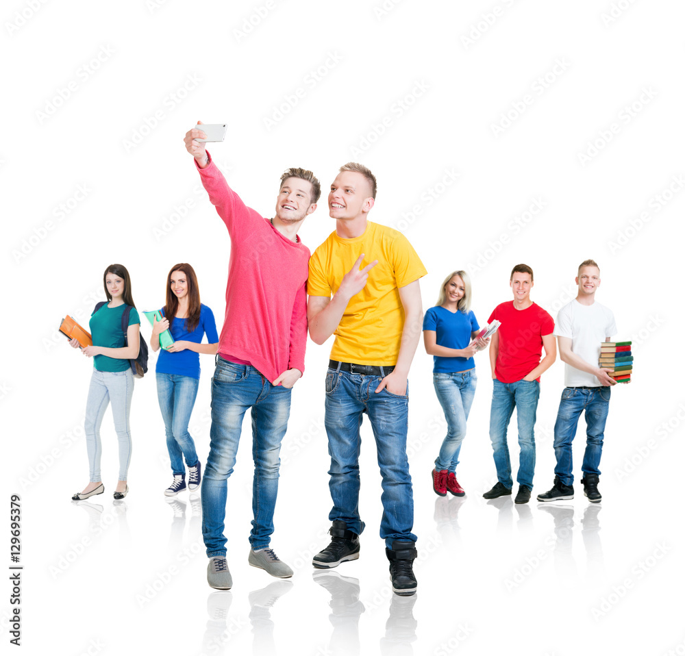 Fototapeta premium Group of teenage students isolated on white