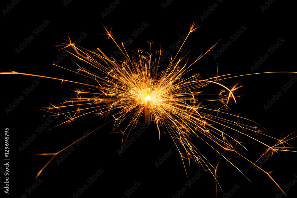 Christmas sparkler on black background Christmas sparkler on black background