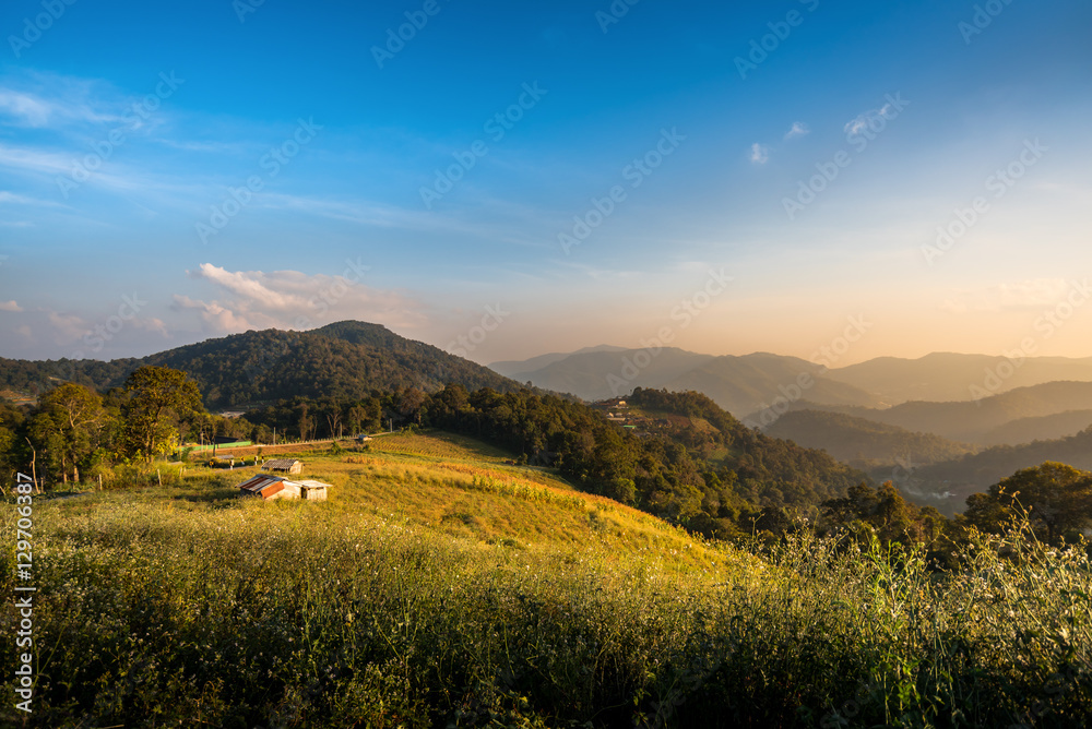 Mountain autumn landscape in evening and traditional houses ,Chiang mai , Thailand