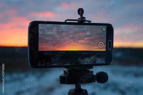 beautiful color of sunset on a mobile phone