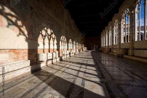 Shadows on the wall. Camposanto building in Pisa  Italy