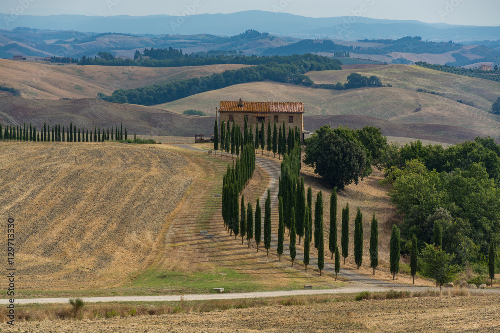 Typical landscape in Tuscany, farmhouse on the hills of Val d'Or