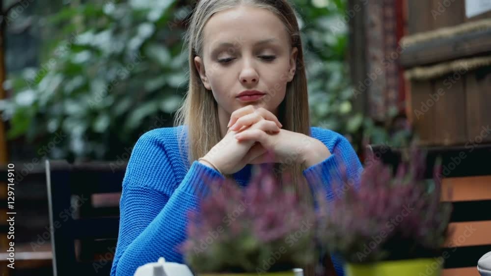 Morose girl sitting in the cafe and looking thoughtful, steadycam shot
Morose girl sitting in the cafe and looking thoughtful, steadycam shot