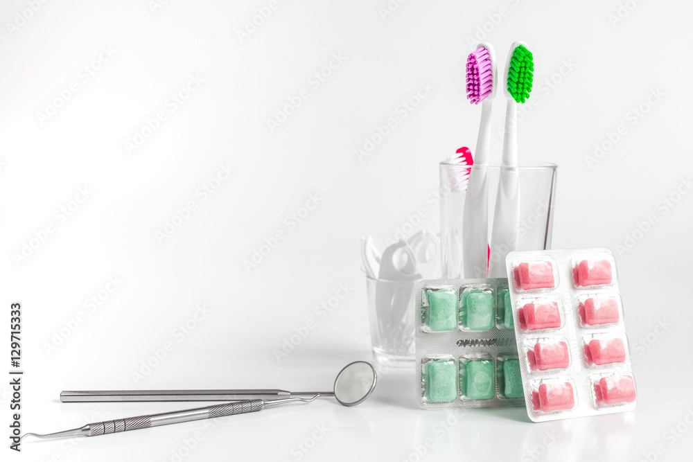 toothbrushes in glass on white background tools for oral care toothbrushes in glass on white background tools for oral care