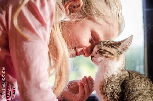 happy blond girl with cat