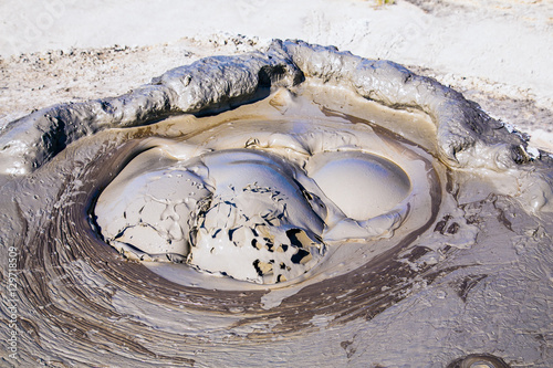 Crater of mud volcano in Gobustan with bubbling mud. Azerbaijan