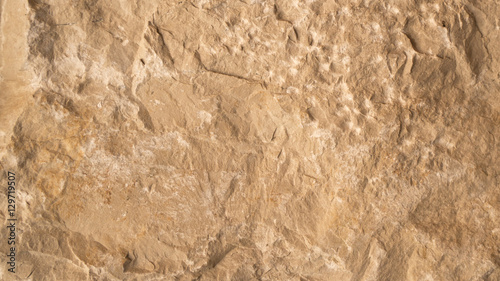 Brown sand stone texture, wall surface of old building photo