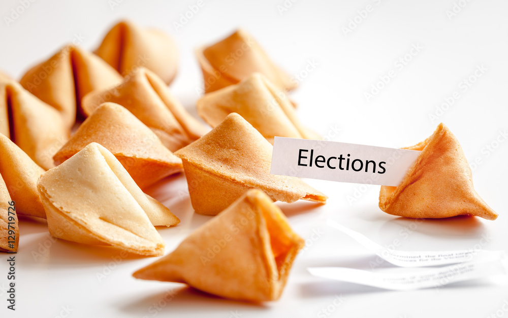 Chinese fortune cookie with prediction on white background Chinese fortune cookie with prediction on white background