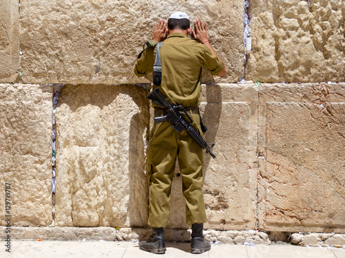 Man with tefillin praying at the Wailing Wall, Jerusalem