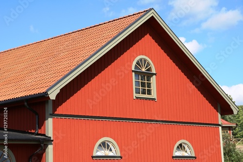 Typical red wooden house in Sweden, Scandinavia photo