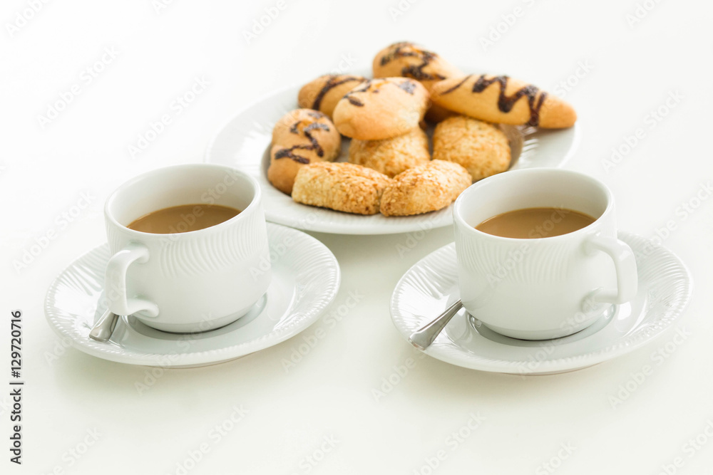 two cups of coffee and biscuits two cups of coffee and biscuits