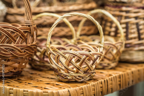 handmade wicker basket on the wicker table at the exhibition