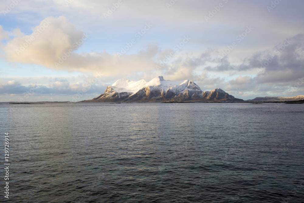 View of a Norwegian fjord with snowy mountains, Nordland, Norway