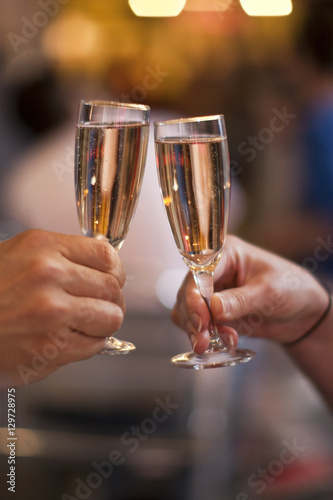 Celebration: cheering with a glass of champagne
