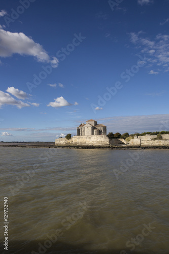 Gironde coastline with view on the village of Talmont sur Gironde and Sainte Radeguonde roman medieval church © Melanie