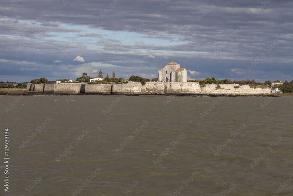 Gironde coastline with view on the village of Talmont sur Gironde and Sainte Radeguonde roman medieval church