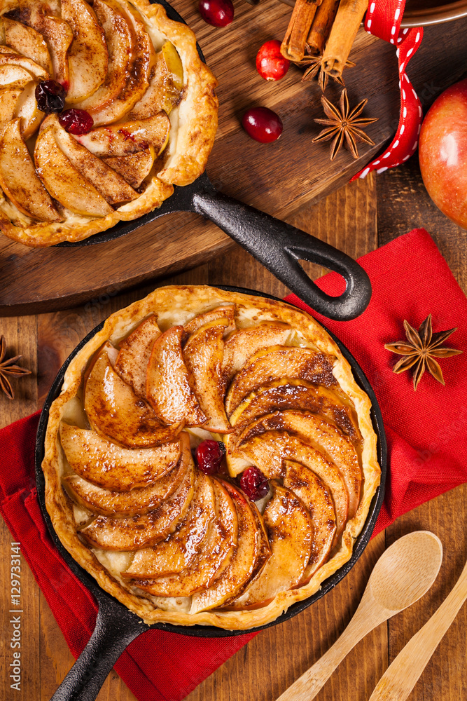 Cast Iron Skillet Apple Cake with Cinnamon. Selective focus. StockFoto Adobe Stock
