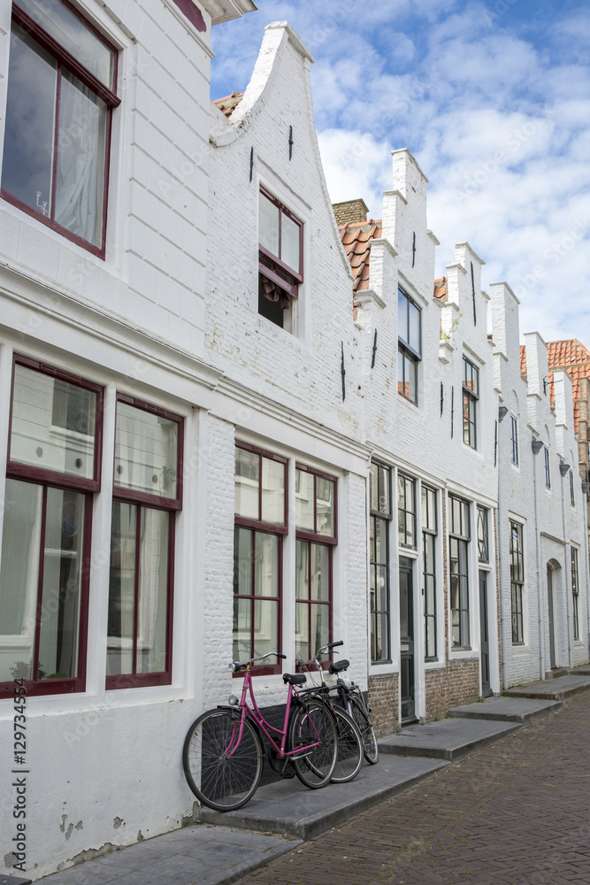 Typicall Dutch cobble stone street with gabble houses aligned, Zierikzee, the Netherlands