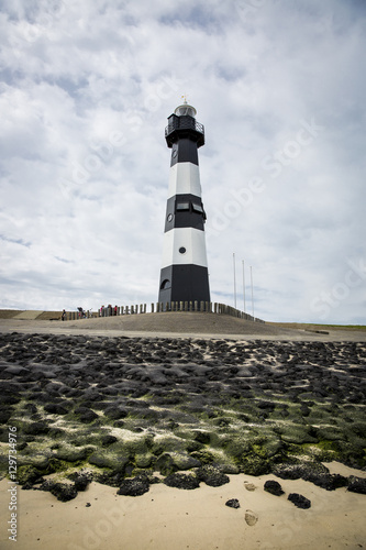 Black and white striped lighthouse, Breskens, The Netherlands photo