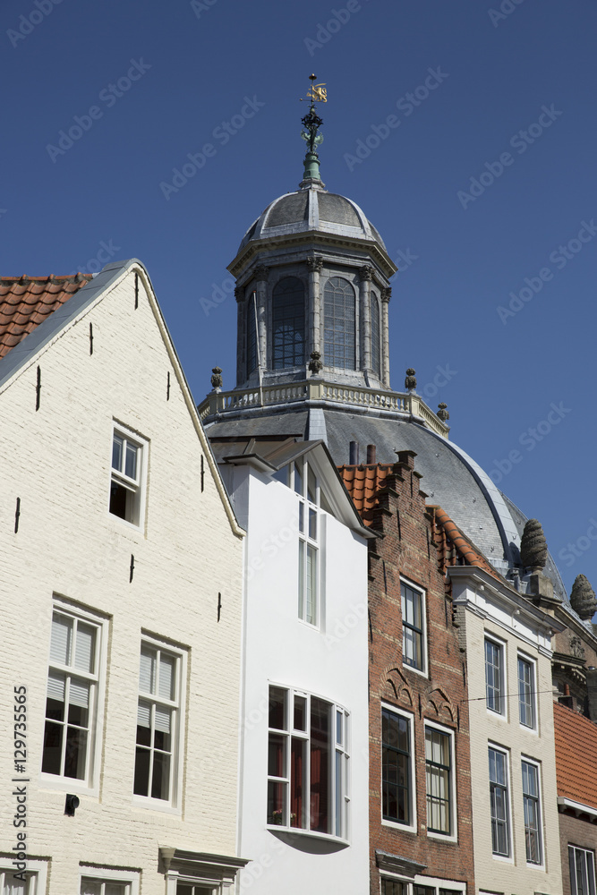 Dutch Gabble house and dome of a church - Oostkerk - Middelburg, The Netherlands