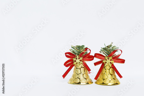 Golden Christmas bell on white background