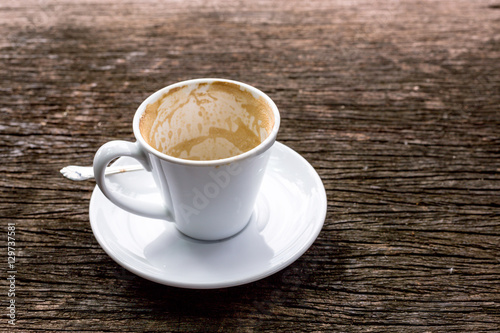Fototapeta Naklejka Na Ścianę i Meble -  empty coffee cup on wood texture grunge texture background