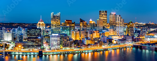 Pittsburgh downtown panorama at dusk viewed from Grandview Overlook across Mo...
