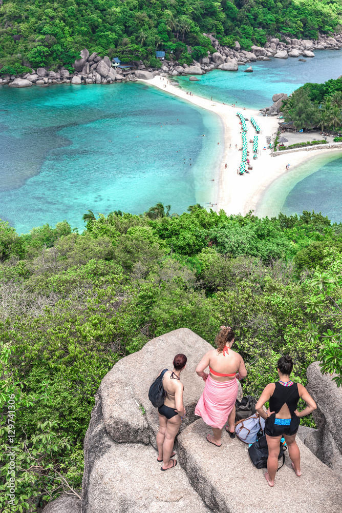 Travellers standing at the view point of Nang yuan island. Thai