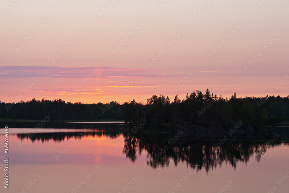 sunset over the forest lake