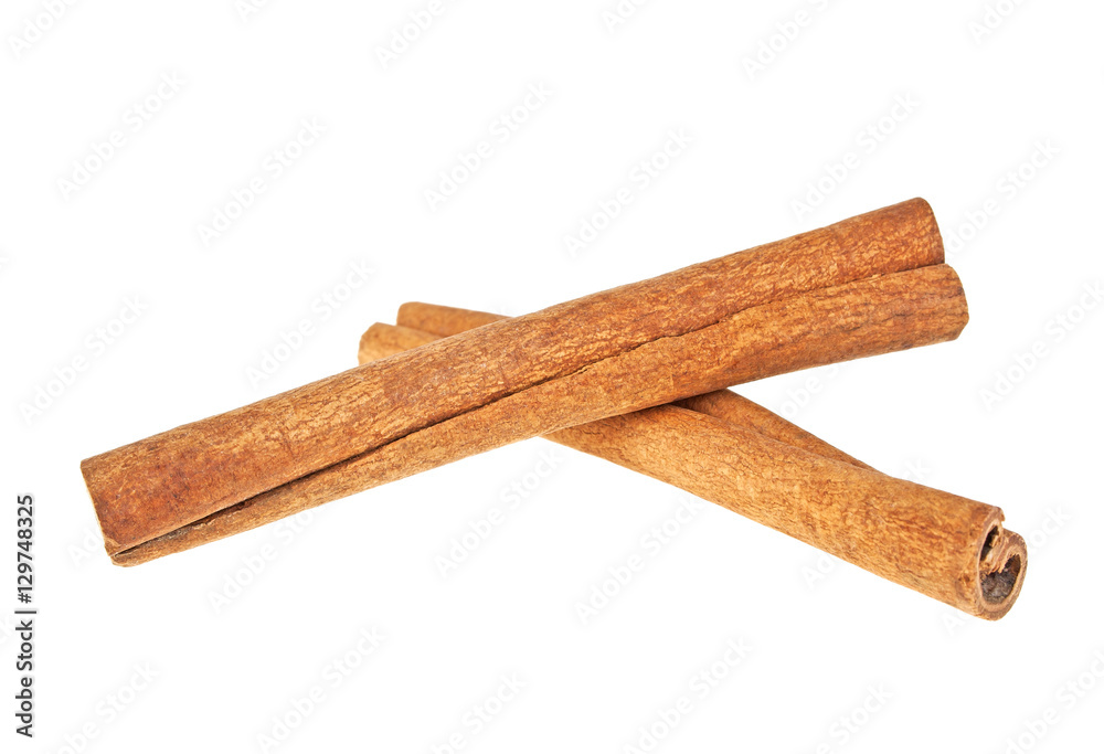 Two cinnamon sticks isolated on white background