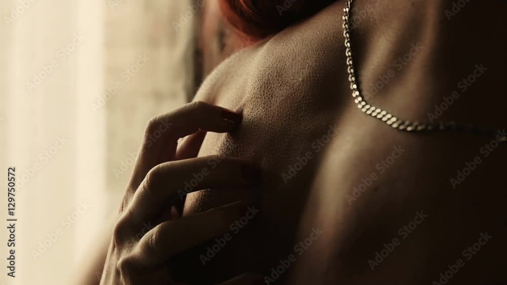 couple having sex: woman scratching back of a young man