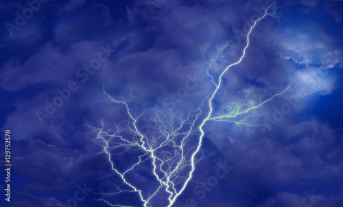 Lightning over dark blue sky