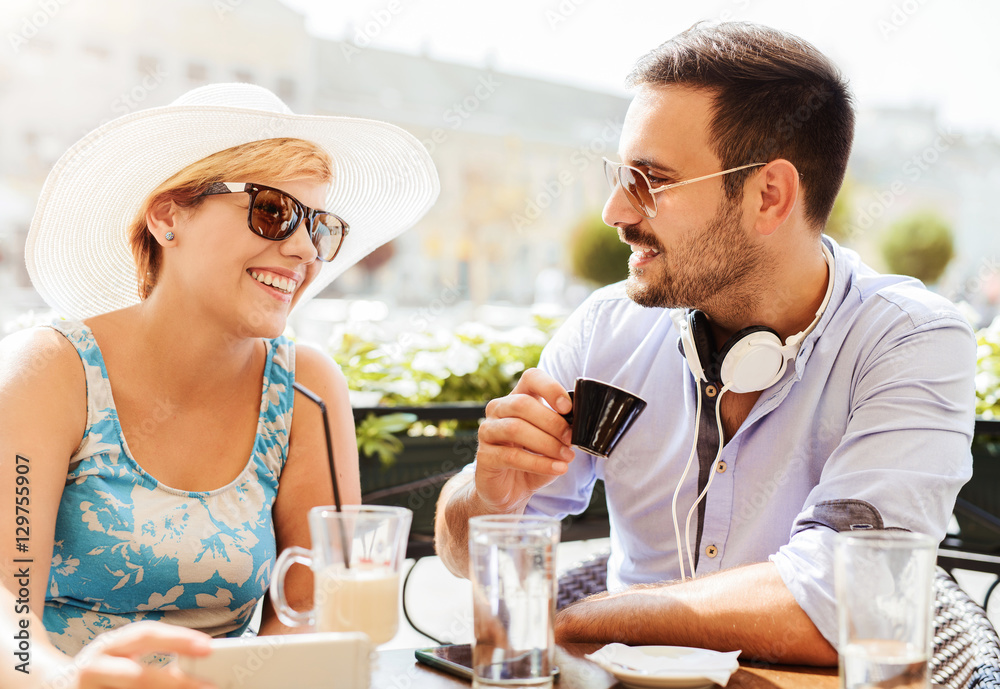 Young couple having a date in a cafe