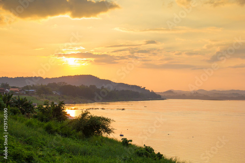 Lanscape view of sunset at Khong river, the Thai-Laos border at Chaingkhan distric, Thailand