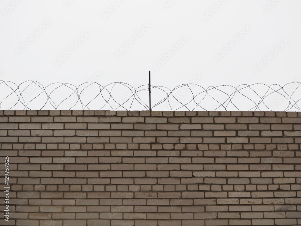 brick fence with barbed wire brick fence with barbed wire