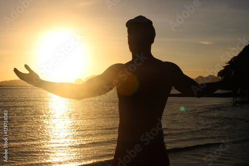 Men whith amazing sunset over the sea. Philippines