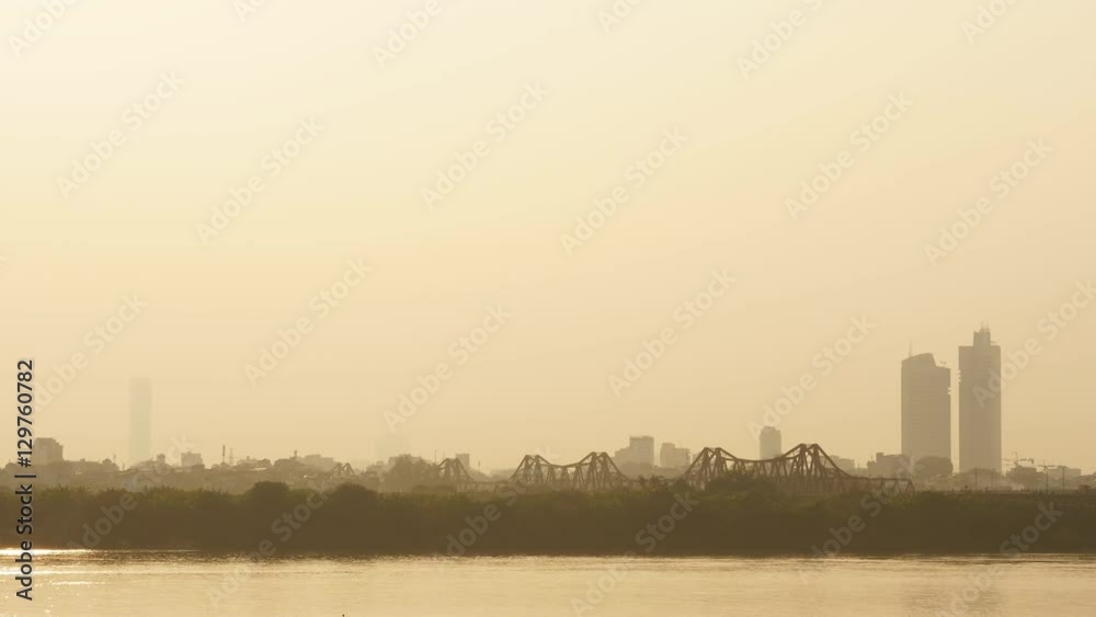 Hanoi city in the evening haze 3. Overlooking the river. Vietnam.
