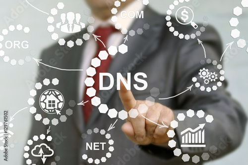 Businessman presses icon dns. Man touched acronym domain name system. Network, web, communication. DNS concept presented by businessman touching on virtual screen - image element furnished by NASA.