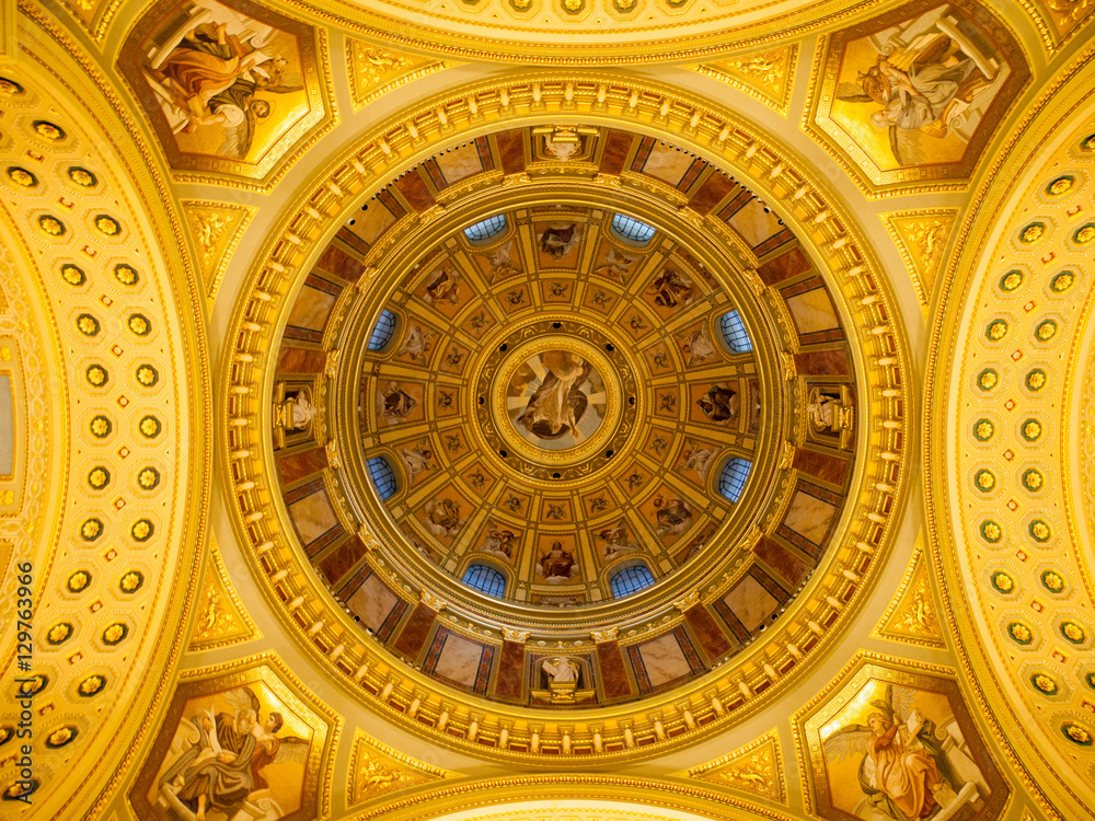 Indoor view of colorful picturesque dome ceiling in Saint Stephen's Basilica, Budapest, Hungary, Europe. UNESCO World Heritage Site.