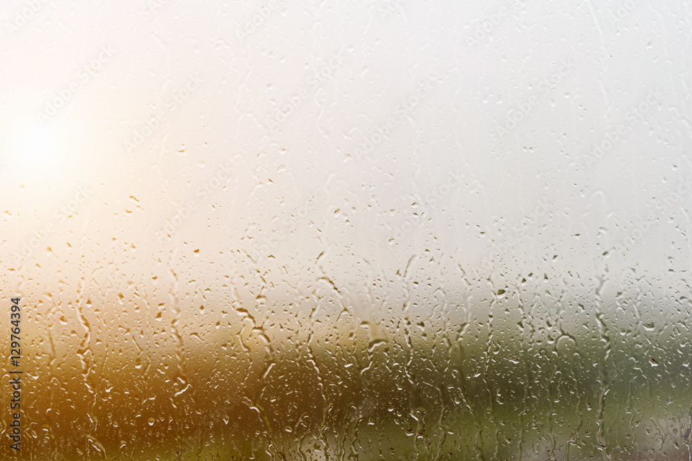 Obraz premium Wet glass with drops, background