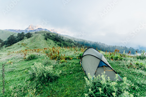 Camping in the Caucasus mountains with Mount Ushba view in the sunrise time in Svaneti  Georgia
